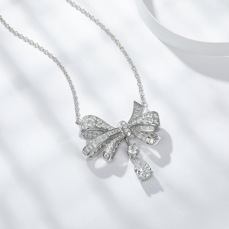 Clara Sterling Silver and Moissanite Pave Bow Pendant